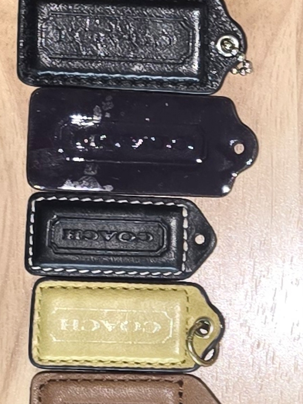 COACH Leather Tag & Charm Set in Black, Yellow, Brown